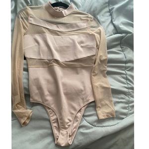 Tan and mesh body suit